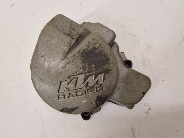 IGNITION COVER (KTM SXF250 2006) 77030002000 77030002100